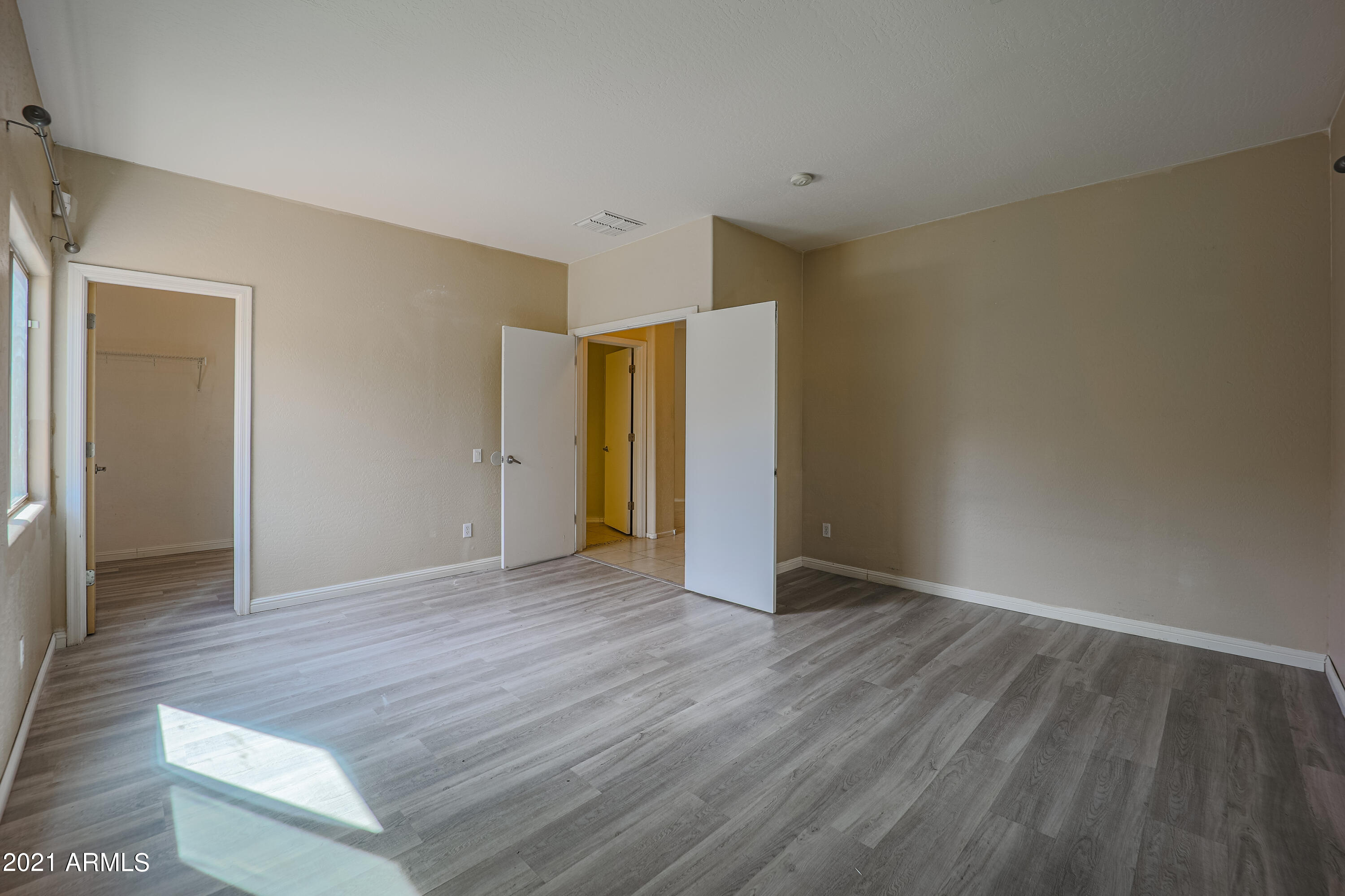 9309 West Rascon Loop Phoenix, AZ 85037 - Photo 7 of 32 bedrrom -down