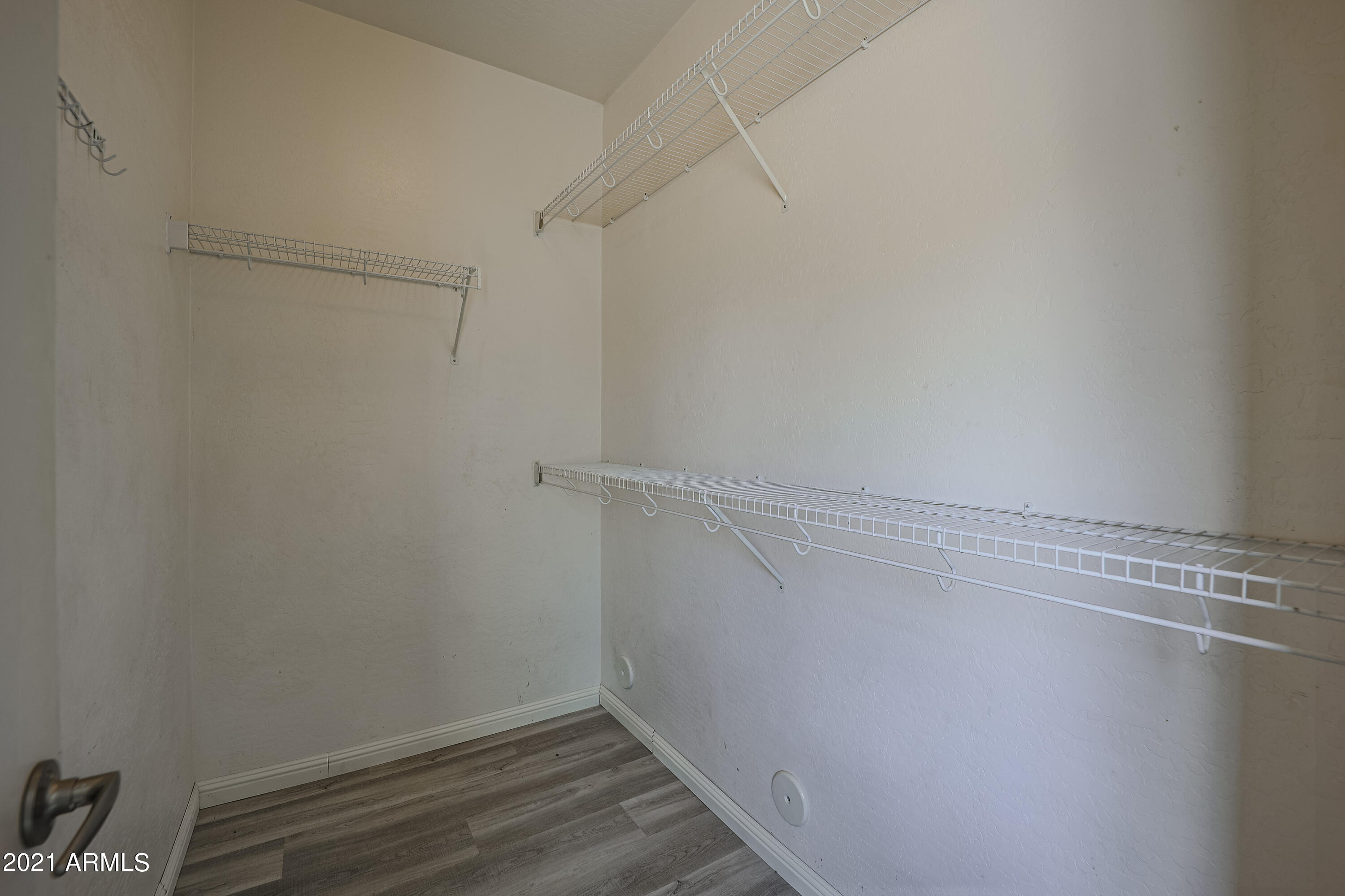 9309 West Rascon Loop Phoenix, AZ 85037 - Photo 8 of 32 bed1-closet