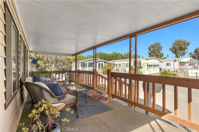 a view of a porch with furniture