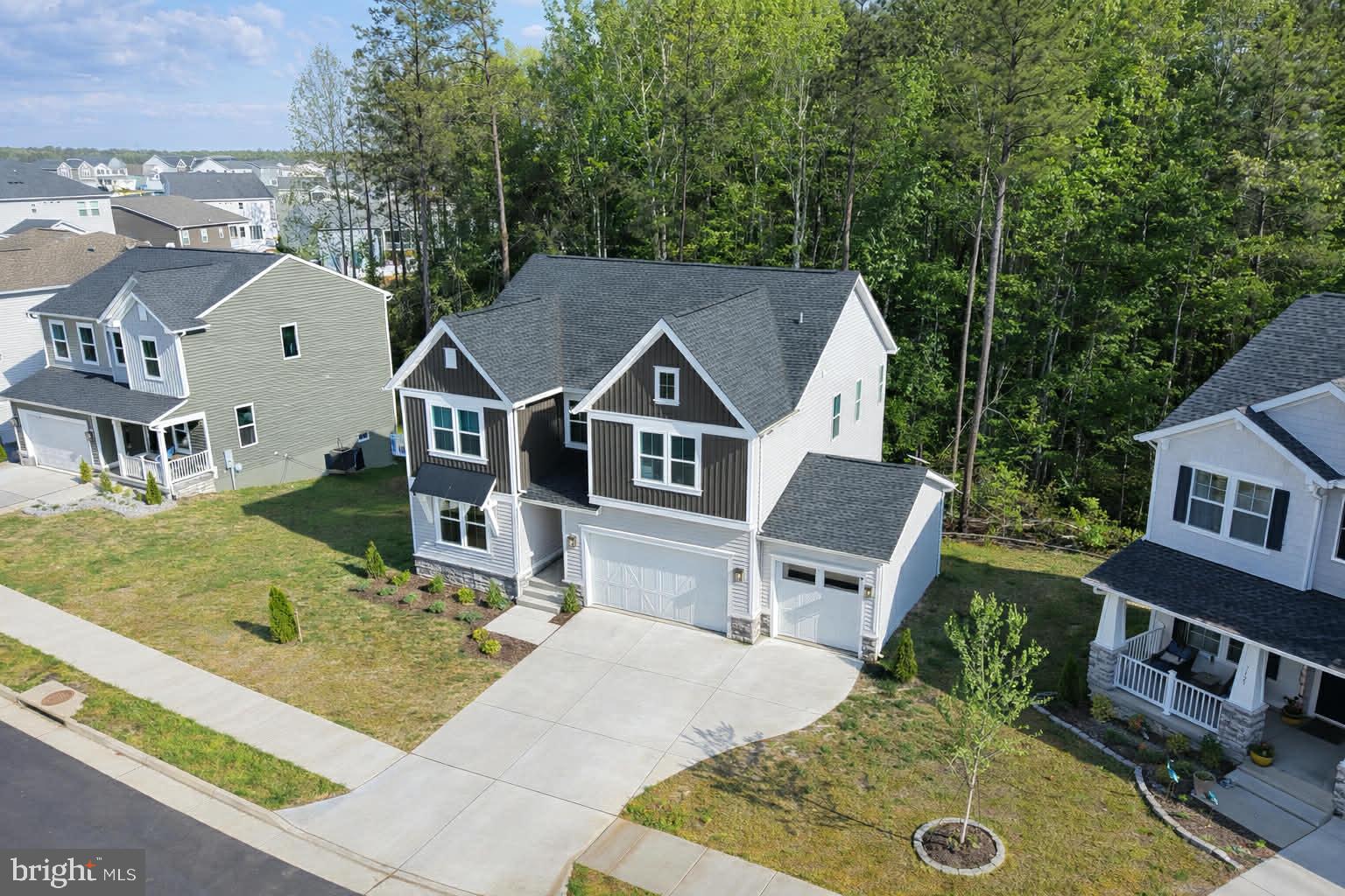 7119 Resolution Way Ruther Glen, VA 22546 - Photo 6 of 79 Charming home nestled by lush greenery.