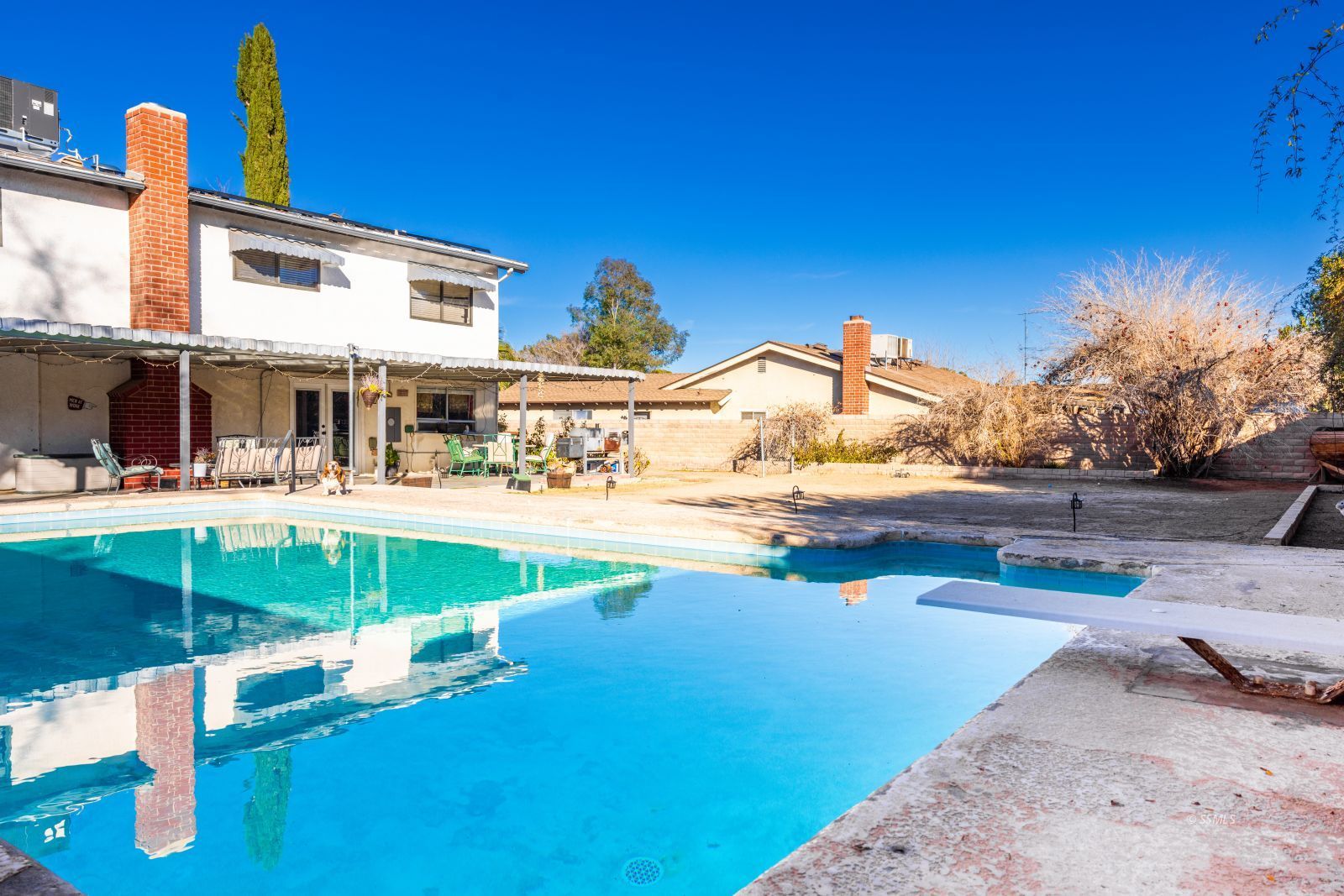 737 Mamie Street Ridgecrest, CA 93555 - Photo 37 of 41 a view of a swimming pool with a patio