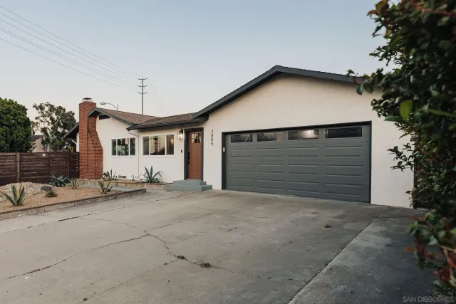 a view of a patio with table and chairs potted plants with wooden floor