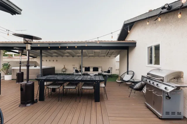 a view of a chairs and table in a patio