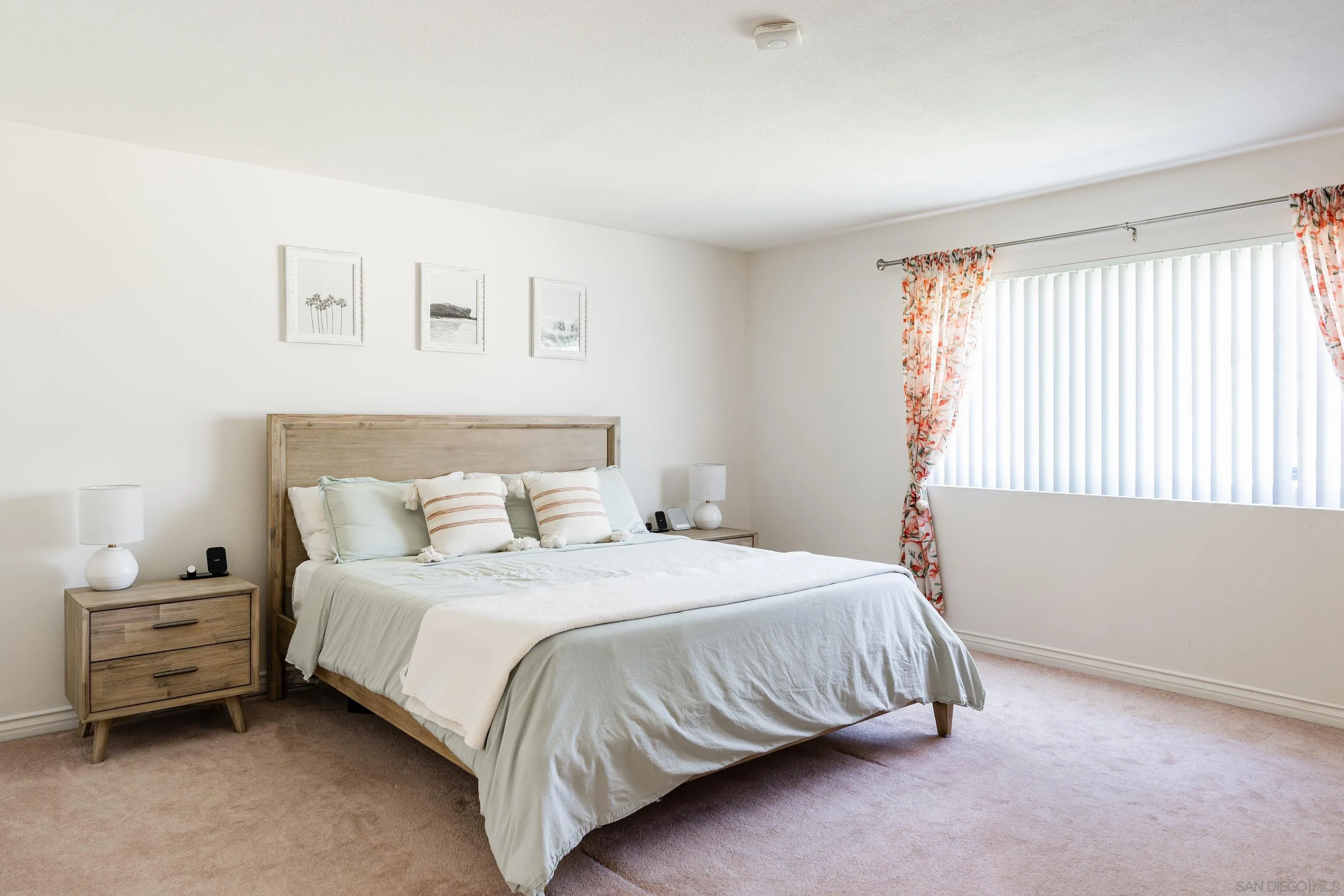 4166 Kimberly Lane Oceanside, CA 92056 - Photo 12 of 25 a bedroom with a bed and a window