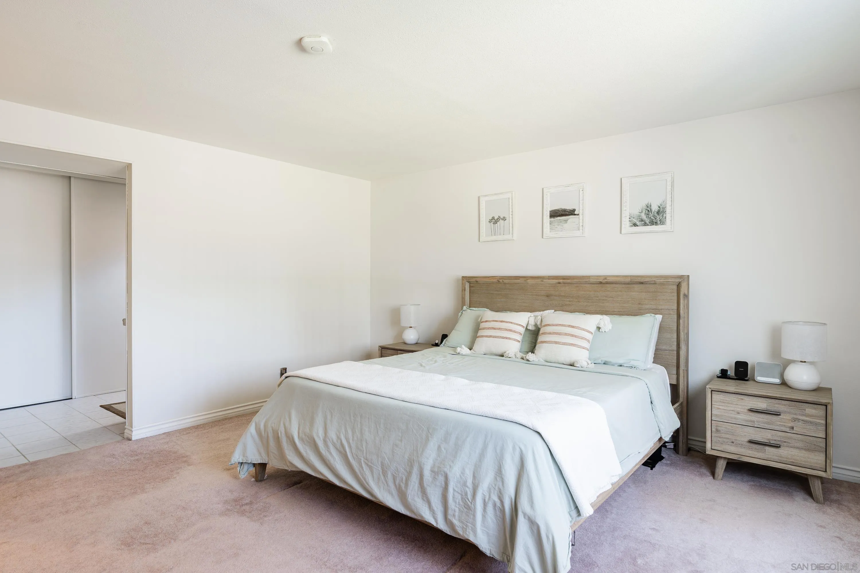 4166 Kimberly Lane Oceanside, CA 92056 - Photo 14 of 25 a bedroom with a bed and a couch