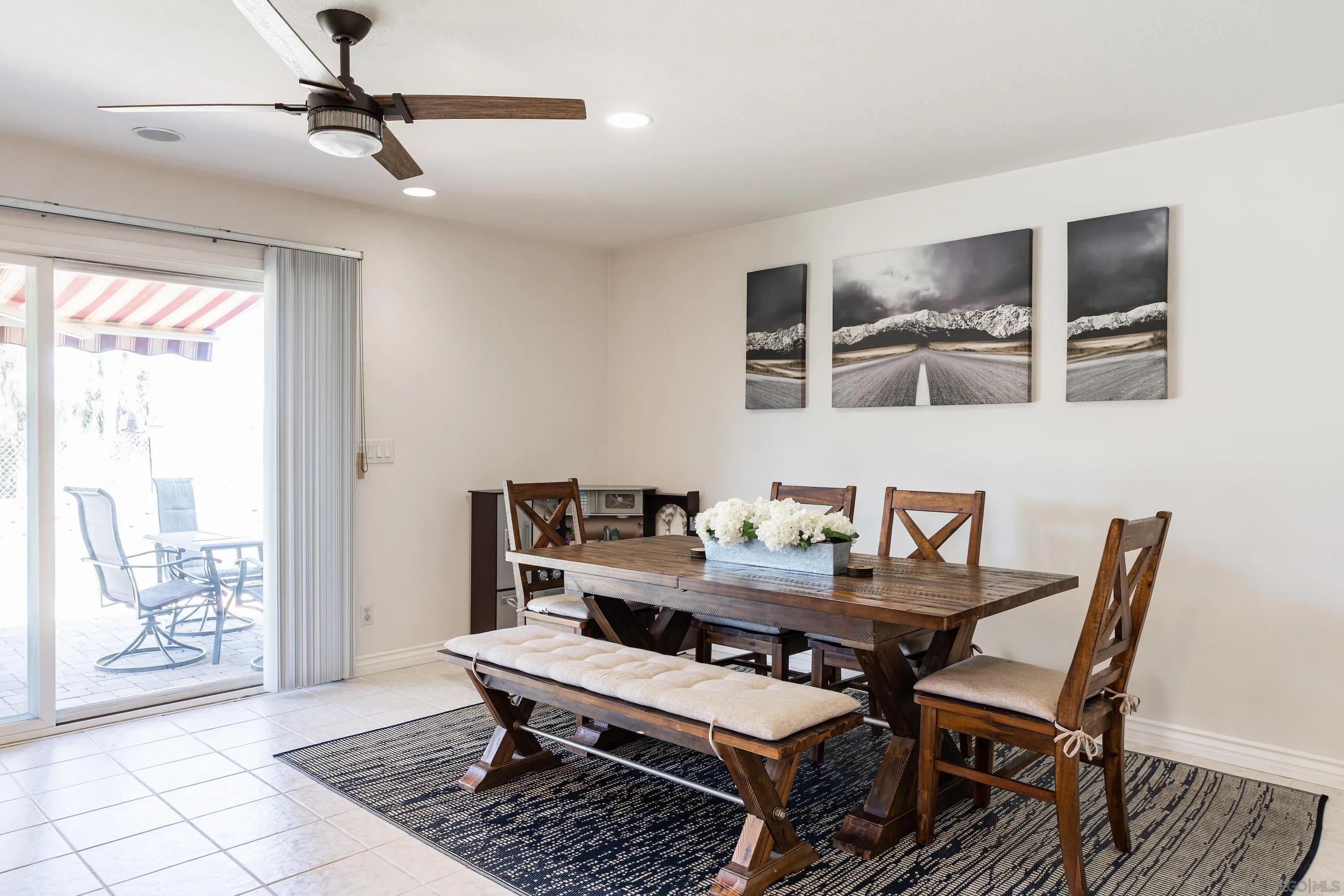 4166 Kimberly Lane Oceanside, CA 92056 - Photo 7 of 25 a view of a dining room with furniture and a window