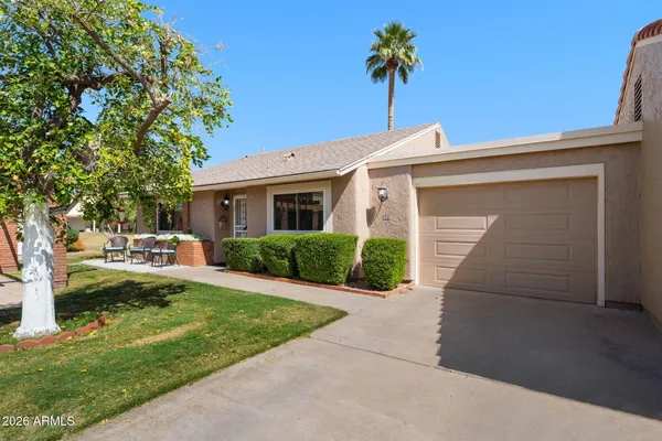 a view of a kitchen with a sink and a stove top oven