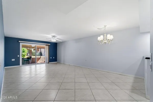 a kitchen with stainless steel appliances a stove a microwave a sink and cabinets