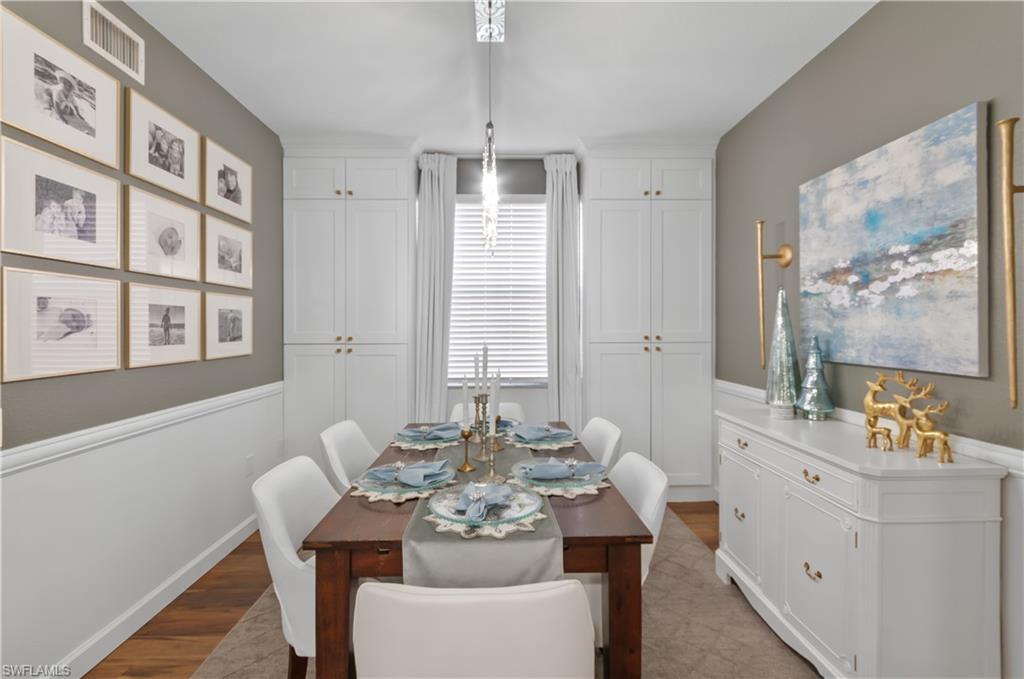 10020 Heather Lane, Unit 901 Naples, FL 34119 - Photo 20 of 34 a view of a dining room with furniture and window