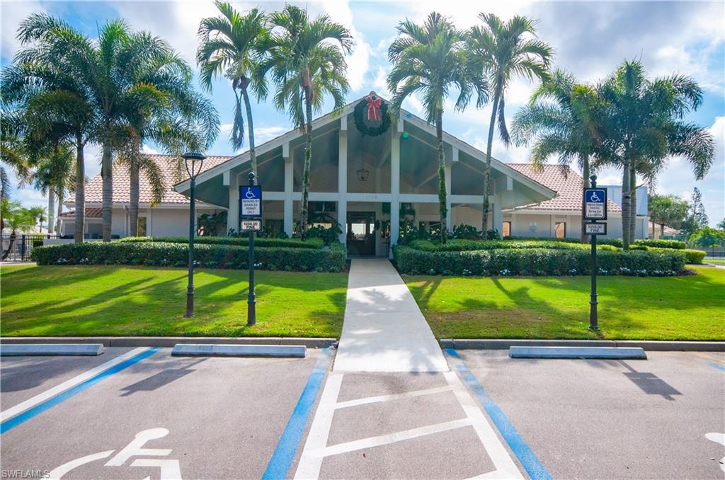10020 Heather Lane, Unit 901 Naples, FL 34119 - Photo 27 of 34 a view of backyard with swimming pool and outdoor seating