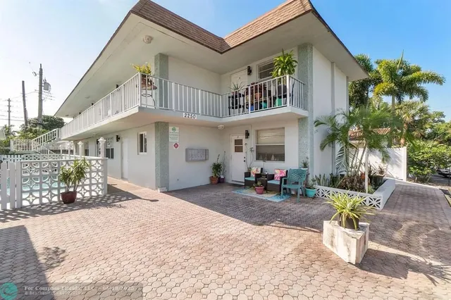 an aerial view of a city with lots of residential buildings
