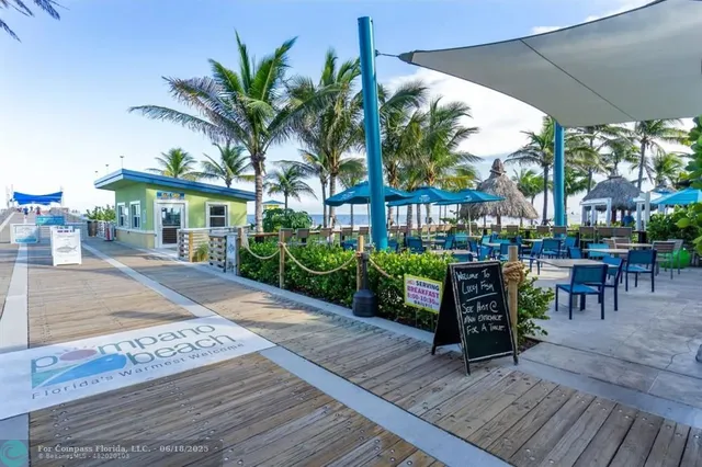 a view of roof deck with chairs