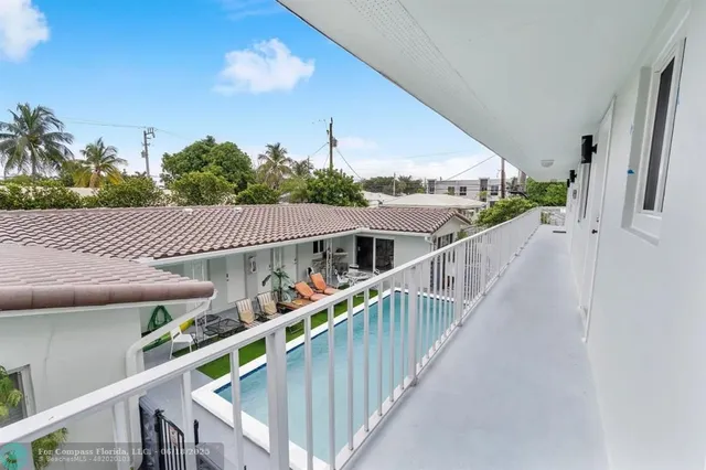 a view of balcony and yard