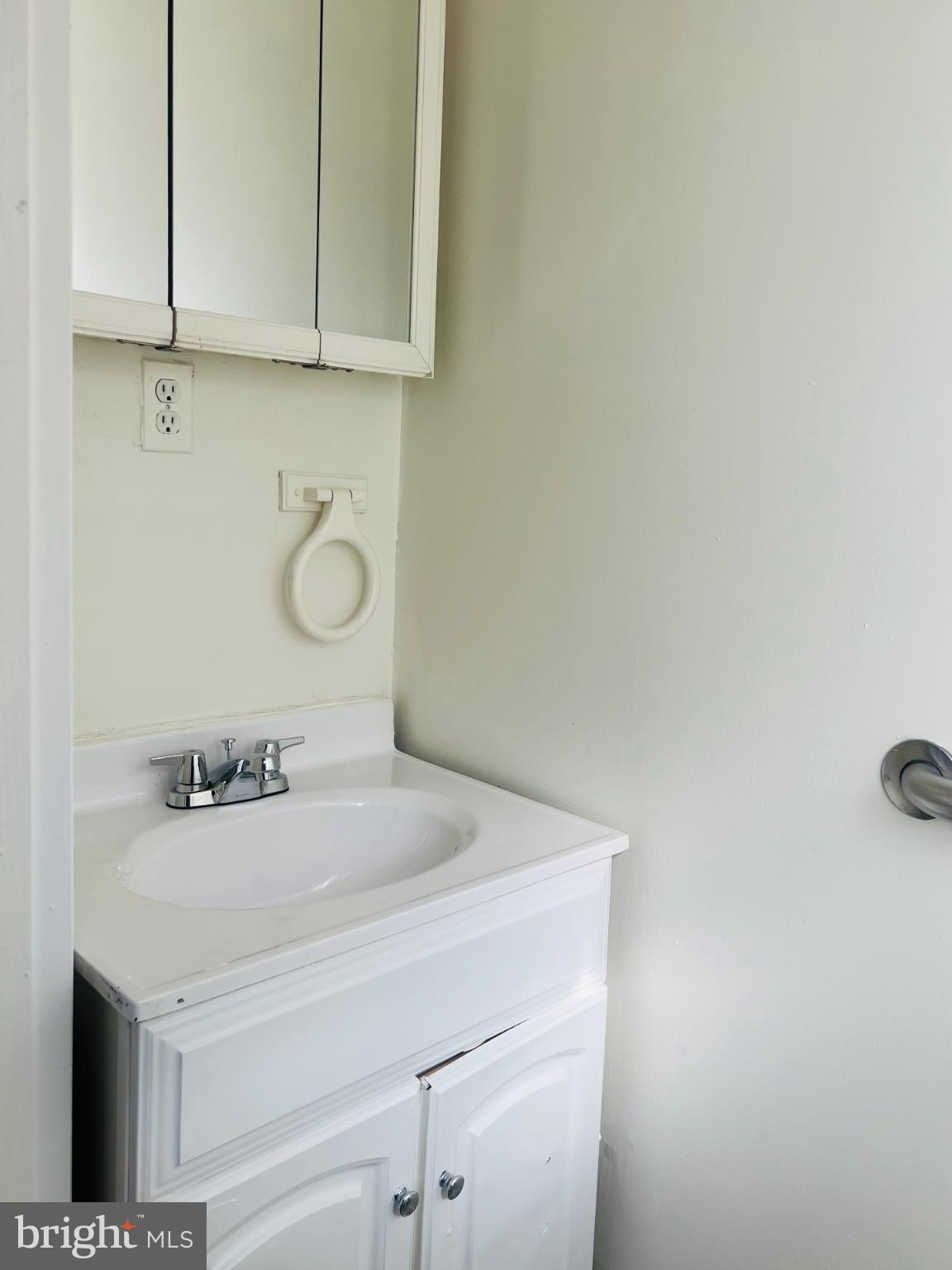 4901 Fitch Place Northeast Washington, DC 20019 - Photo 8 of 47 a bathroom with a sink and a mirror