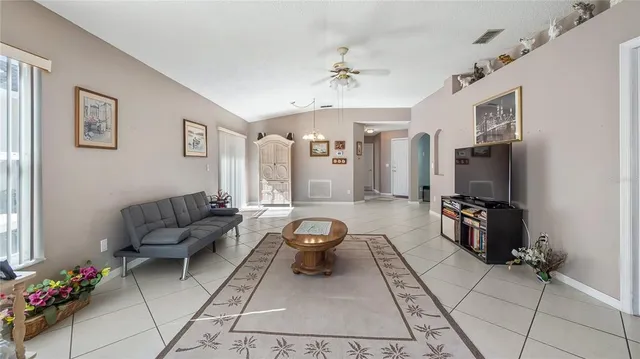 a kitchen with cabinets appliances a sink and a counter top space
