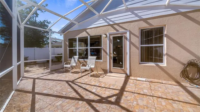 a view of balcony with wooden floor
