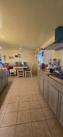 a bedroom with a bed and a mirror