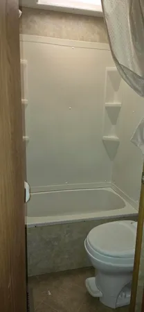 a view of a backyard with sitting area and furniture