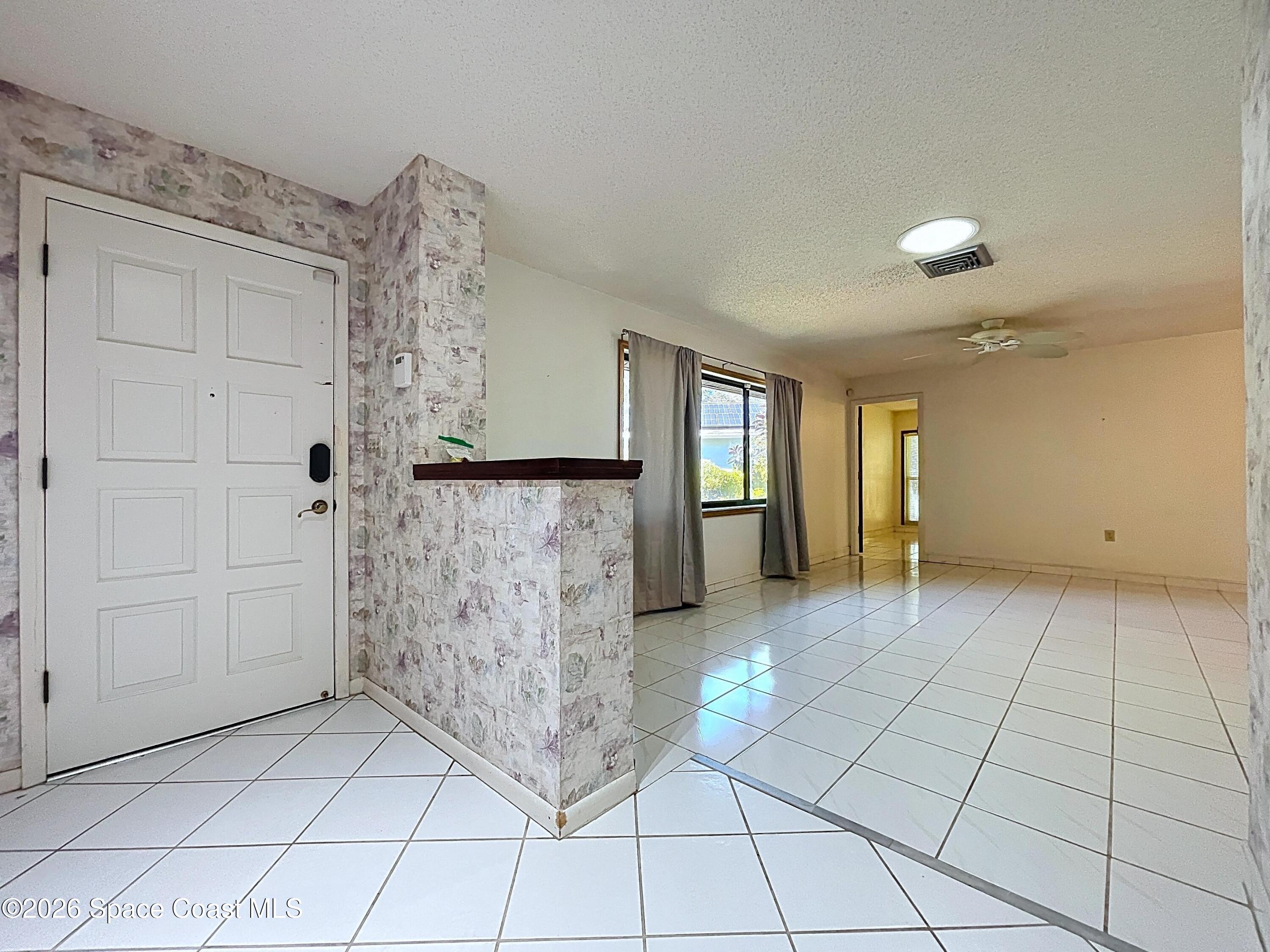 9591 128th Terrace North Largo, FL 33773 - Photo 20 of 90 a view of an empty room and window