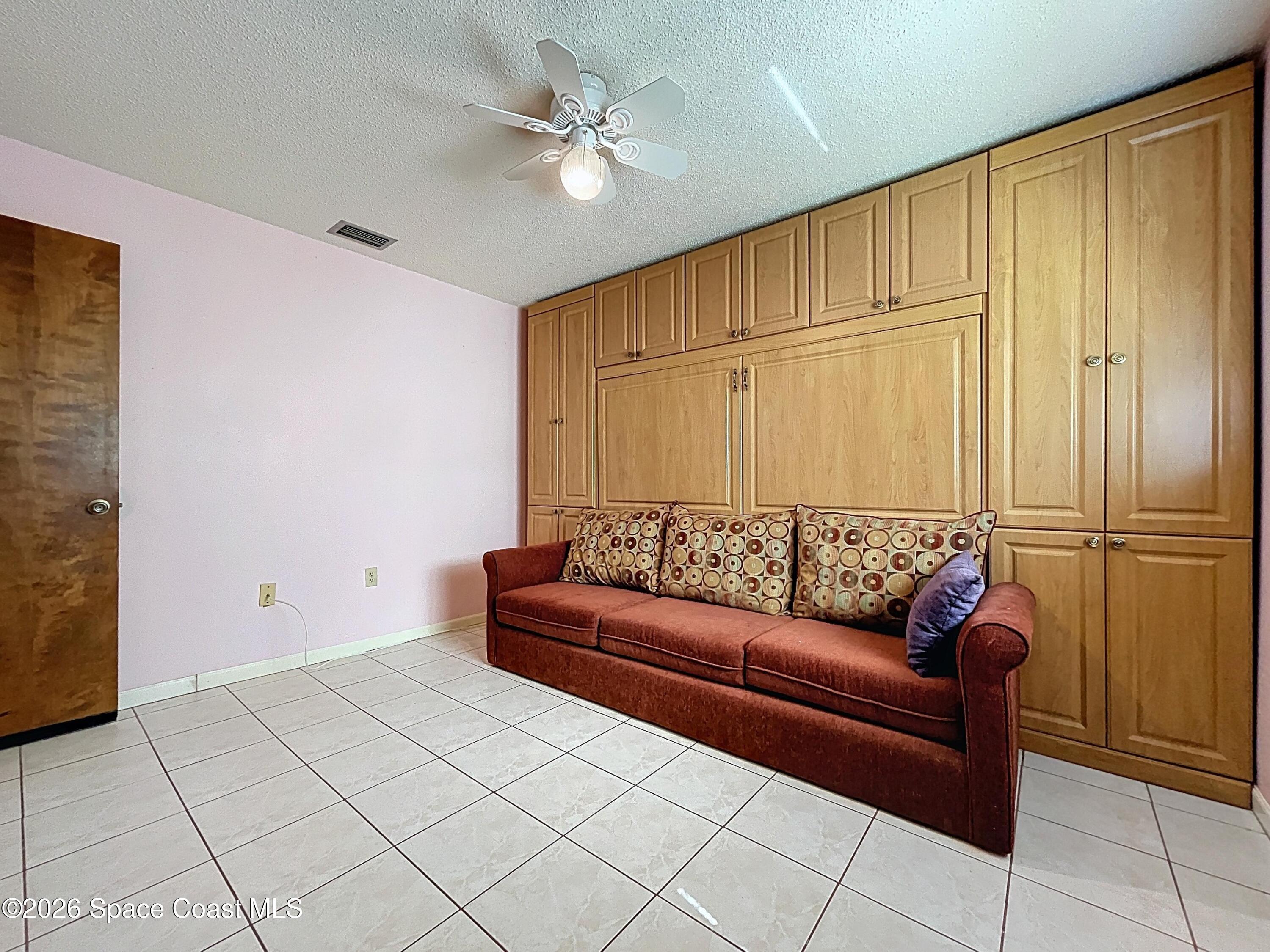 9591 128th Terrace North Largo, FL 33773 - Photo 66 of 90 a living room with furniture