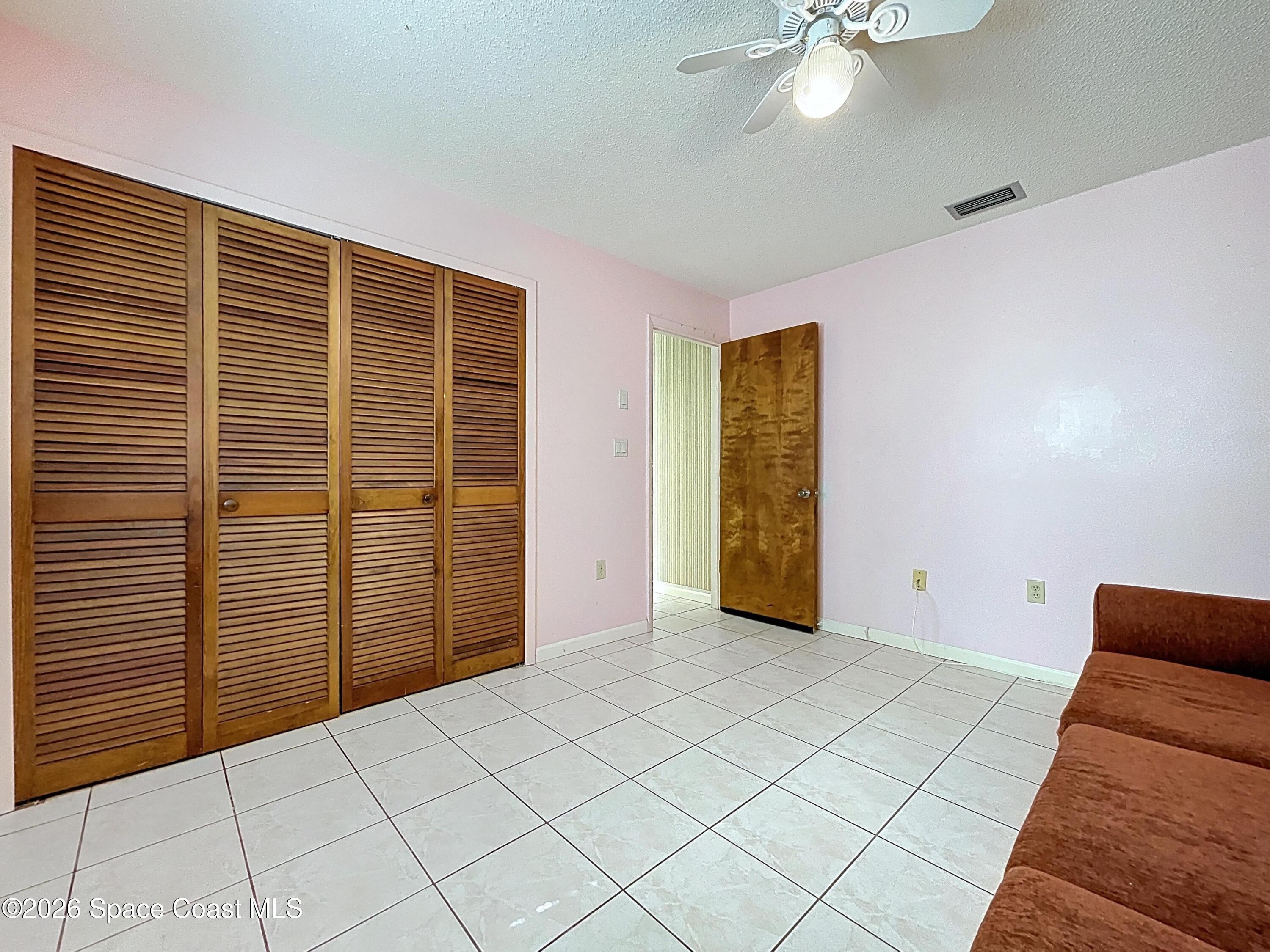 9591 128th Terrace North Largo, FL 33773 - Photo 67 of 90 a view of livingroom with hardwood