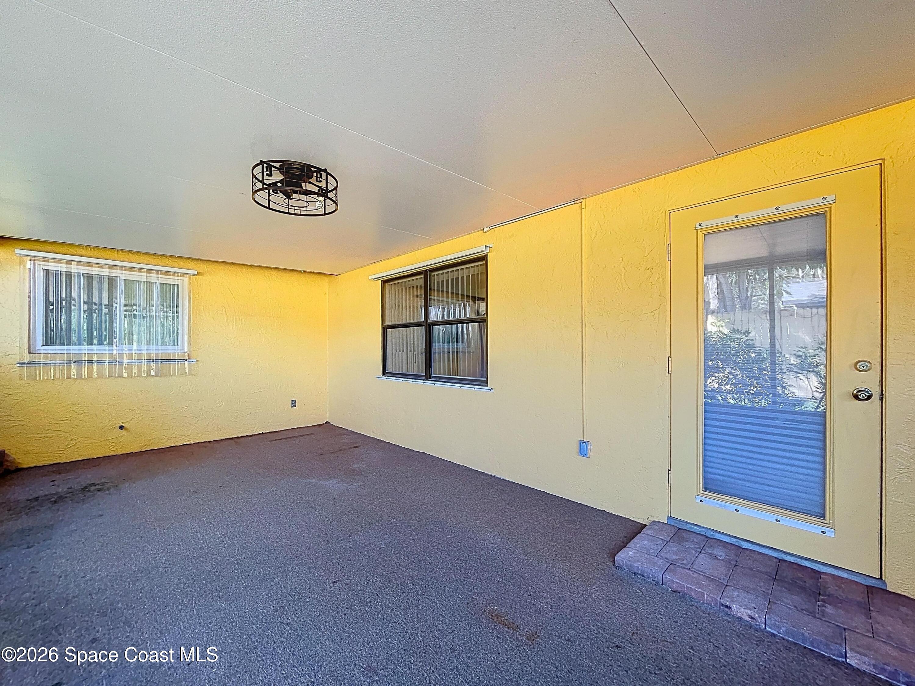 9591 128th Terrace North Largo, FL 33773 - Photo 74 of 90 an empty room with windows