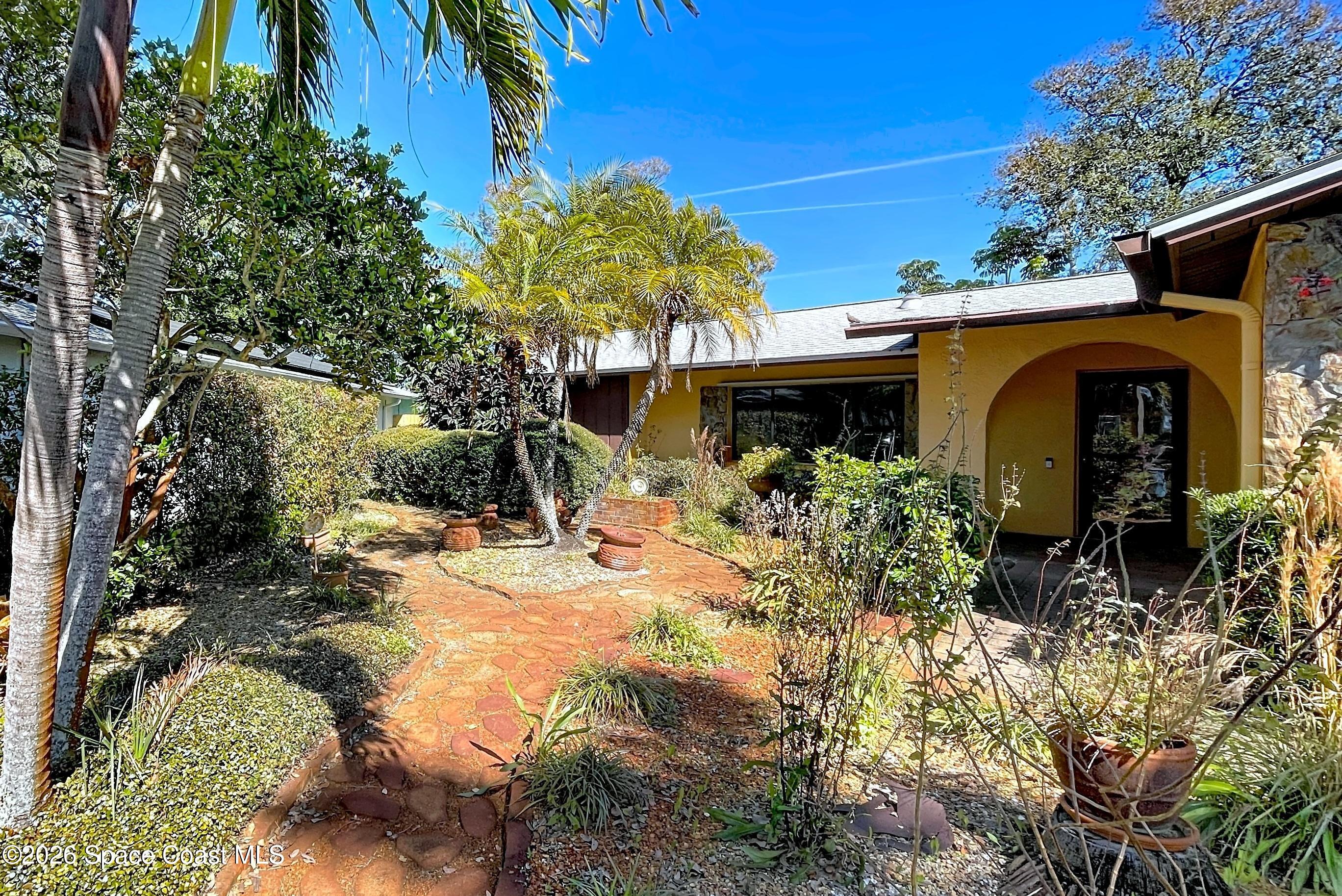 9591 128th Terrace North Largo, FL 33773 - Photo 87 of 90 a view of a house with sitting area