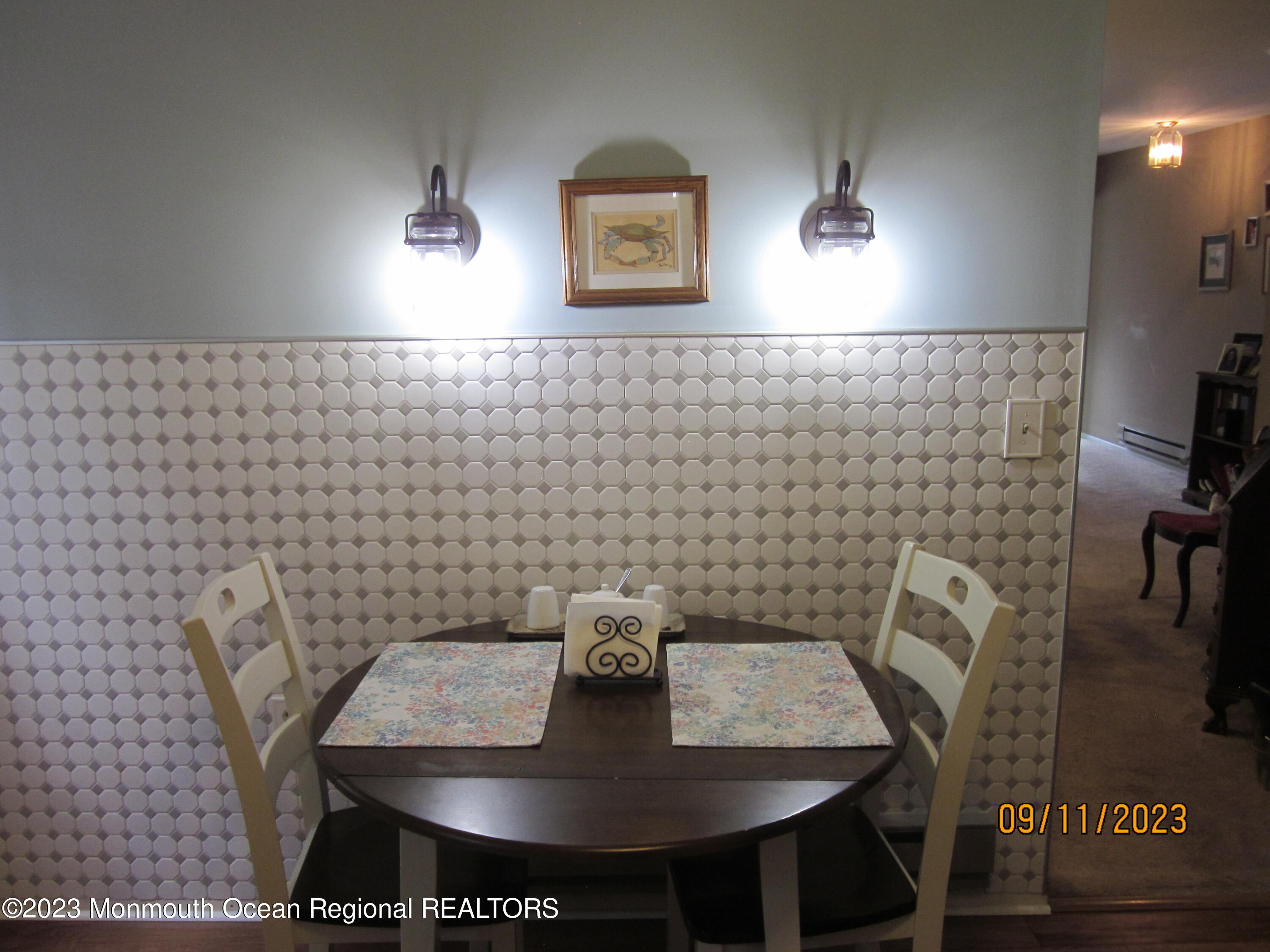 53 B Berkshire Road Whiting, NJ 08759 - Photo 16 of 37 a view of a dining room with furniture and wooden floor