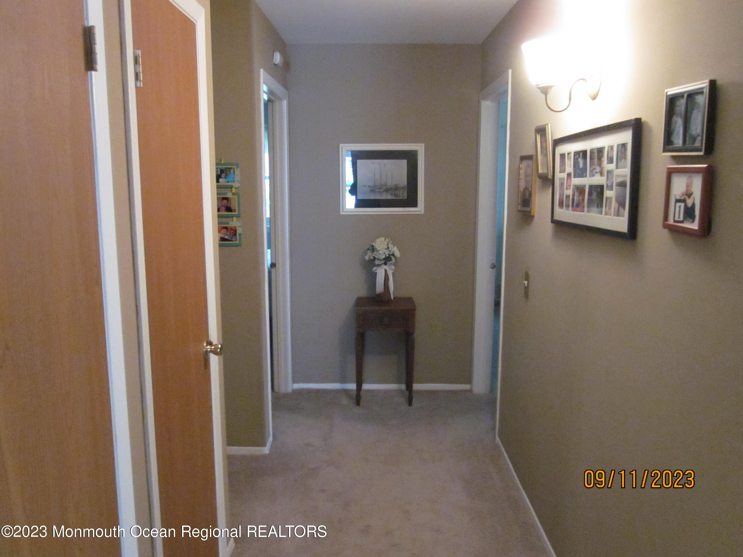 53 B Berkshire Road Whiting, NJ 08759 - Photo 18 of 37 a view of a hallway with some storage area