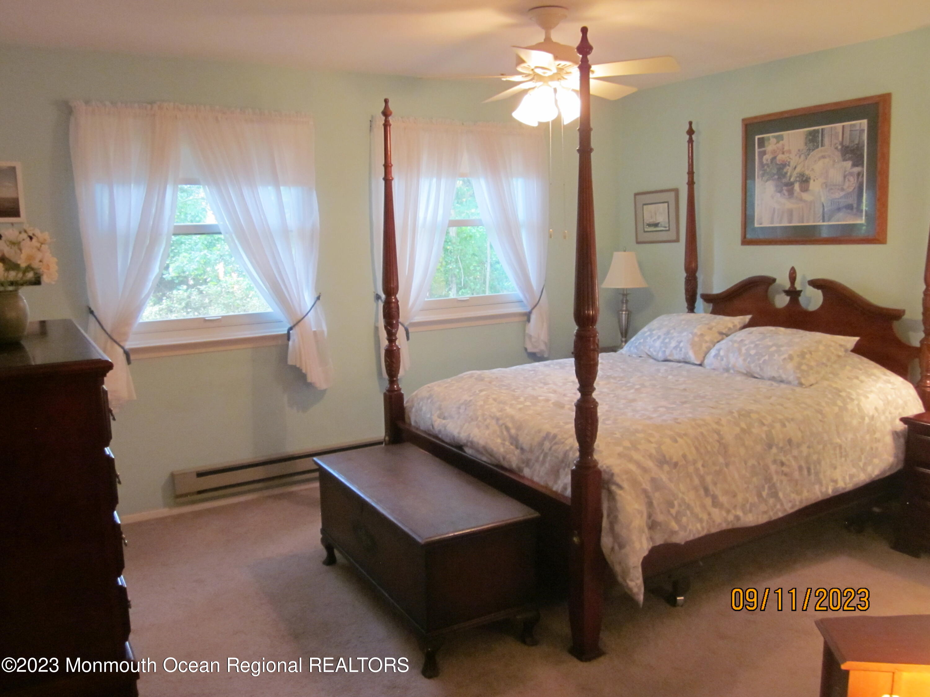 53 B Berkshire Road Whiting, NJ 08759 - Photo 20 of 37 a bedroom with a bed and a window