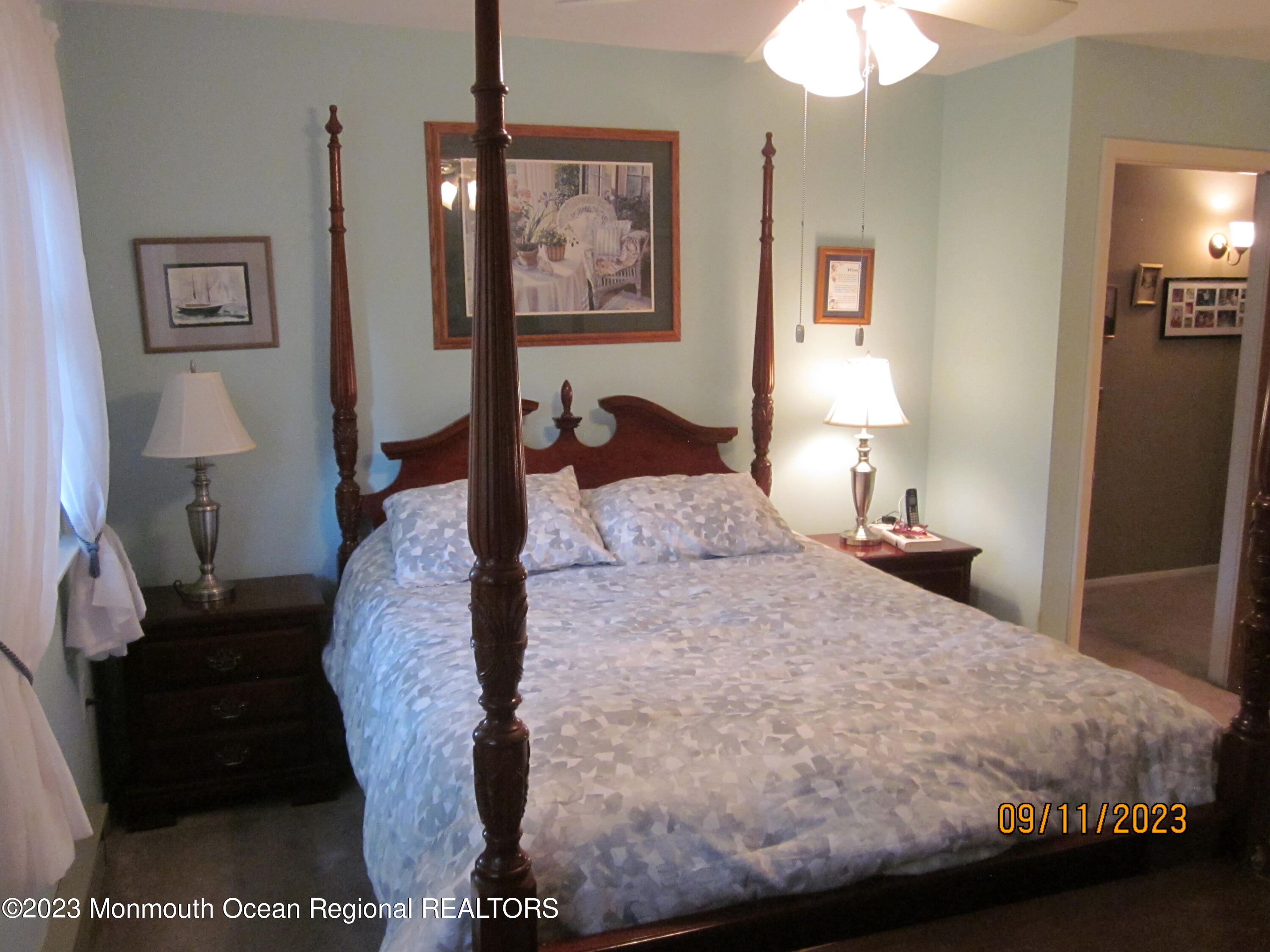 53 B Berkshire Road Whiting, NJ 08759 - Photo 21 of 37 a bedroom with a bed and a painting on the wall