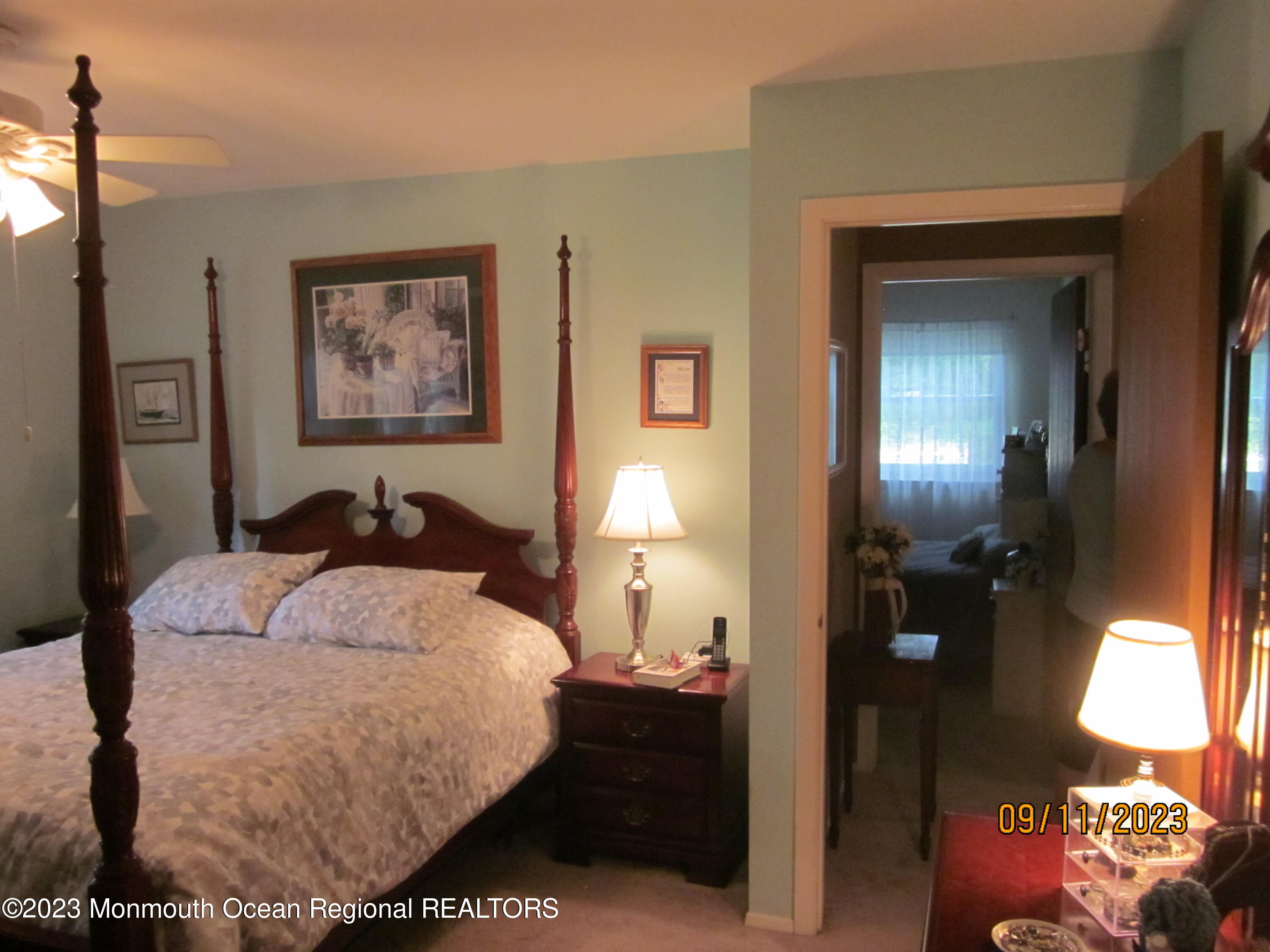53 B Berkshire Road Whiting, NJ 08759 - Photo 22 of 37 a bedroom with a bed and a painting on the wall