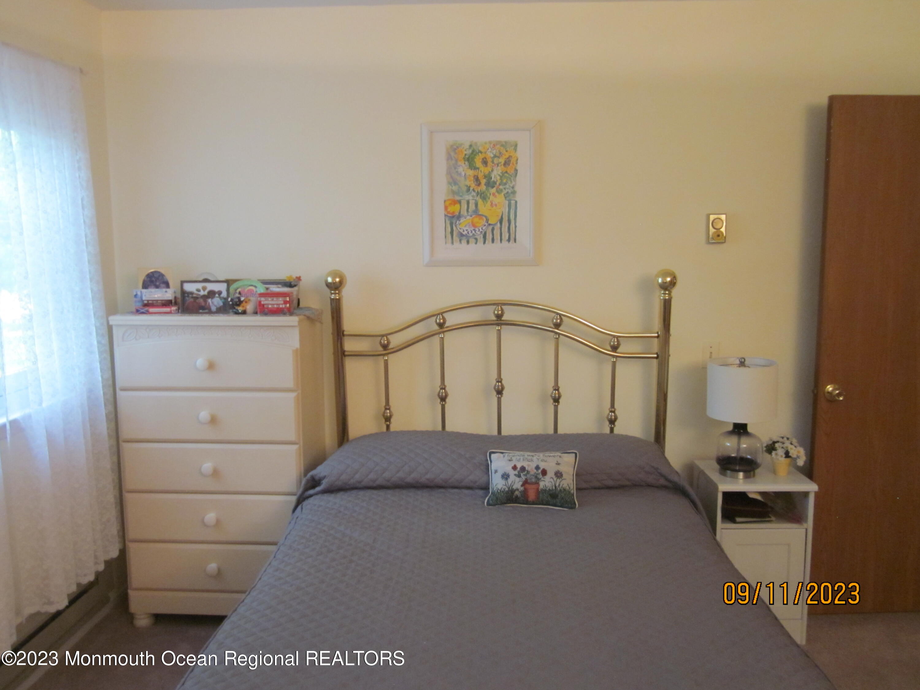 53 B Berkshire Road Whiting, NJ 08759 - Photo 27 of 37 a view of a bed room with a bed