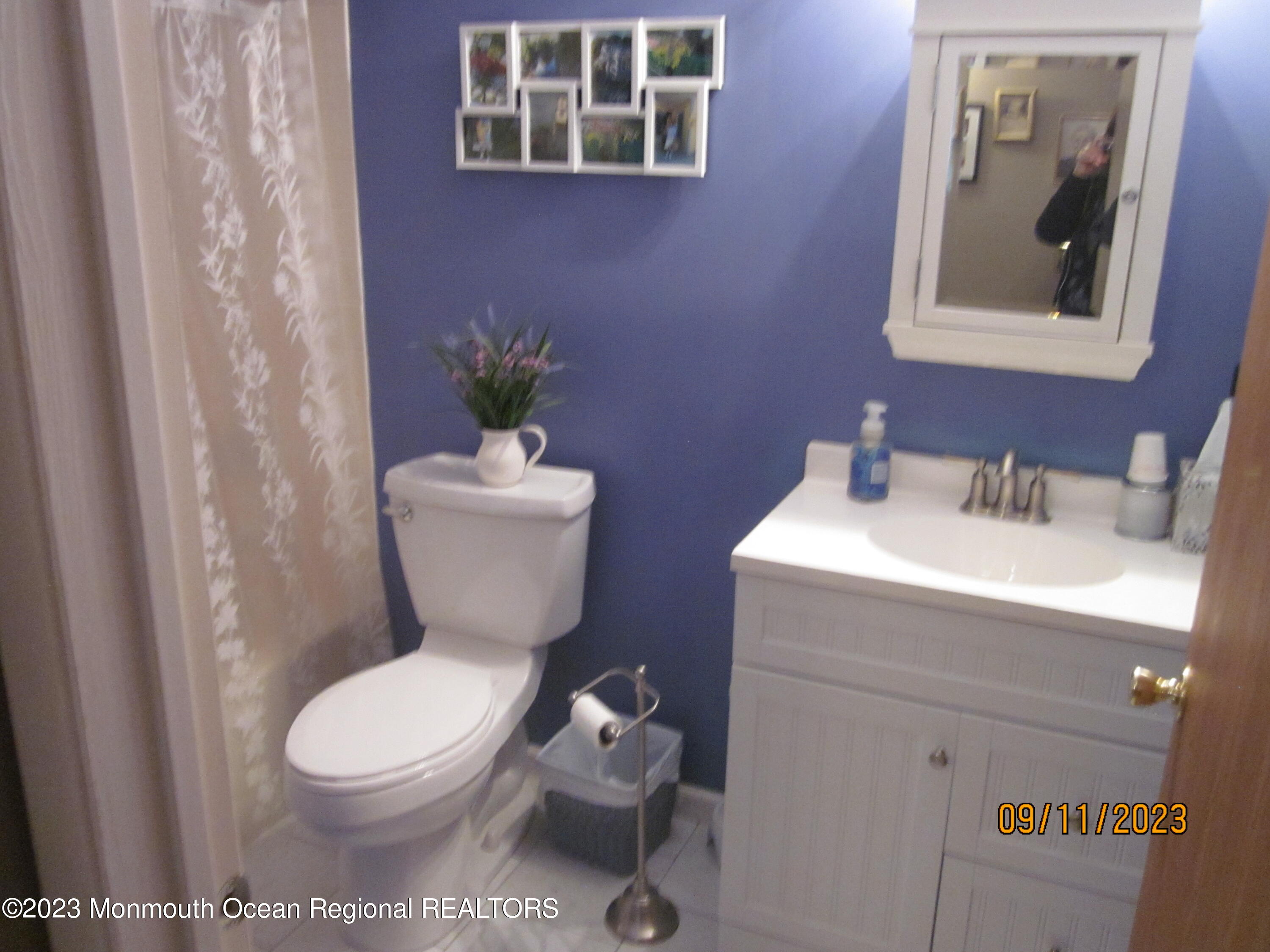 53 B Berkshire Road Whiting, NJ 08759 - Photo 30 of 37 a bathroom with a toilet a sink and mirror