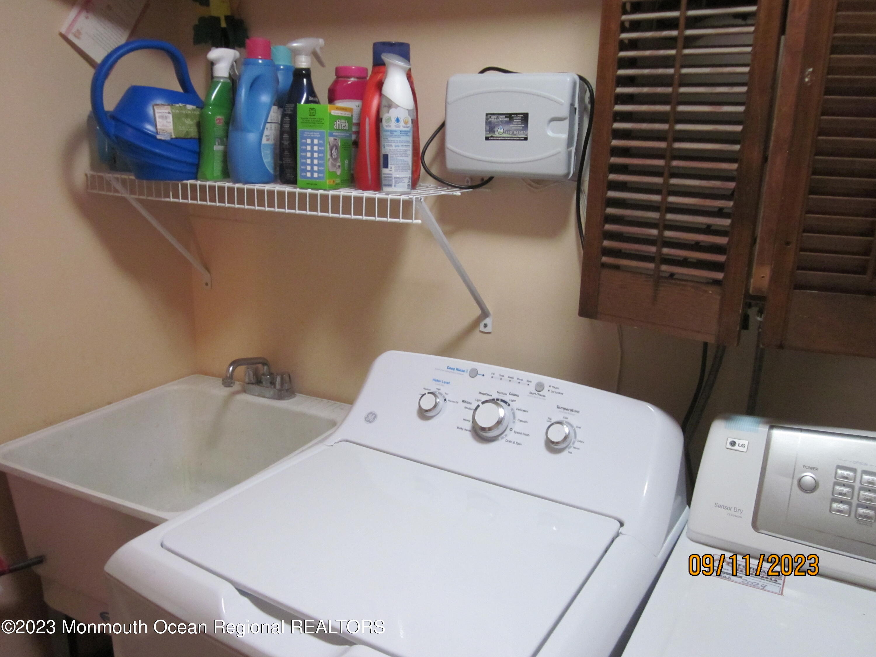 53 B Berkshire Road Whiting, NJ 08759 - Photo 35 of 37 a utility room with dryer and washer