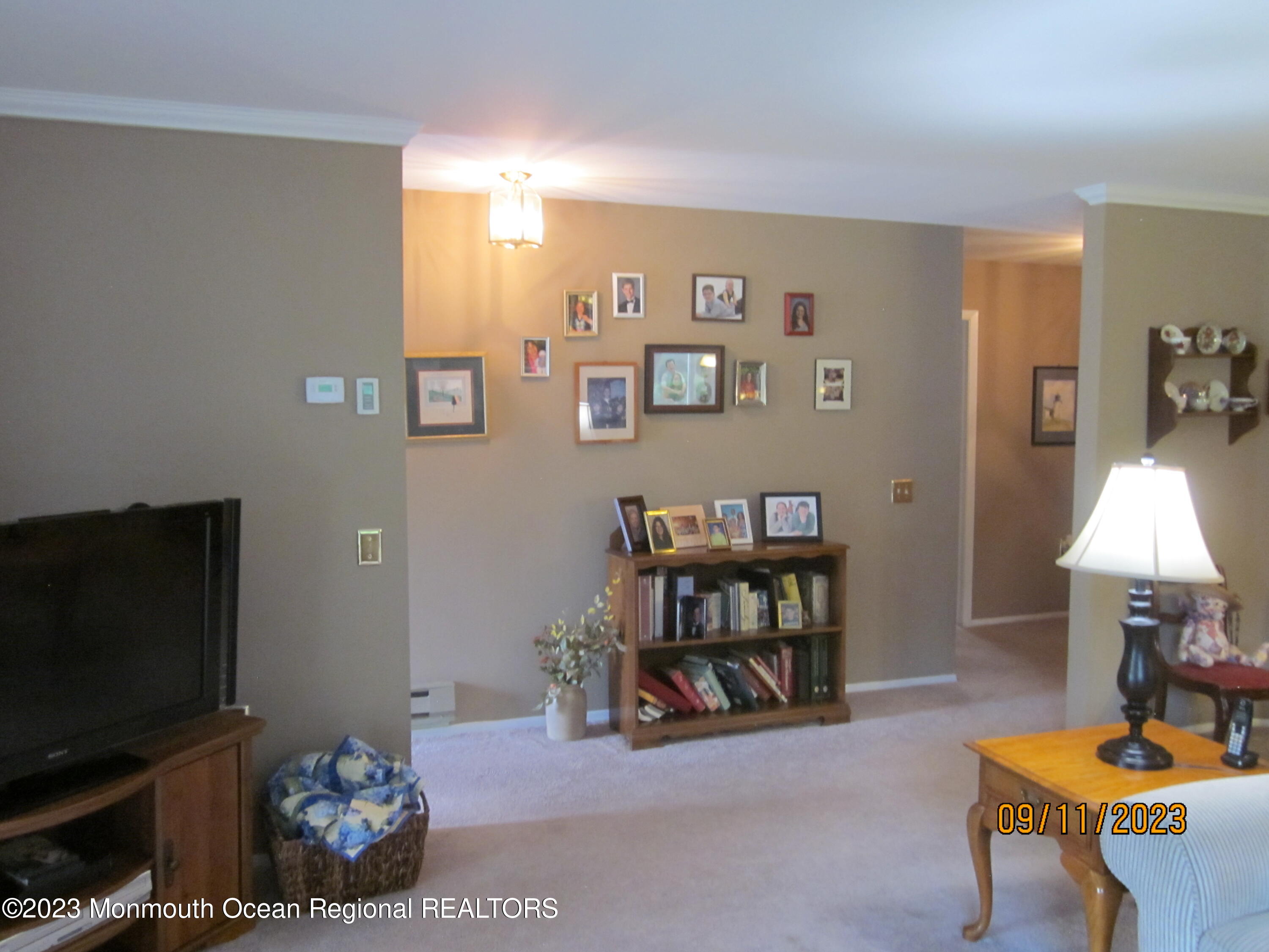 53 B Berkshire Road Whiting, NJ 08759 - Photo 9 of 37 a living room with furniture and a flat screen tv