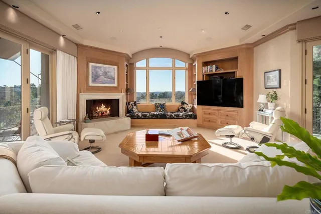 a bed room with a bed and a fireplace