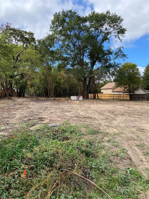 178 Patton Lane Tyler, TX 75704 - Photo 5 of 8 a view of a white house with a yard