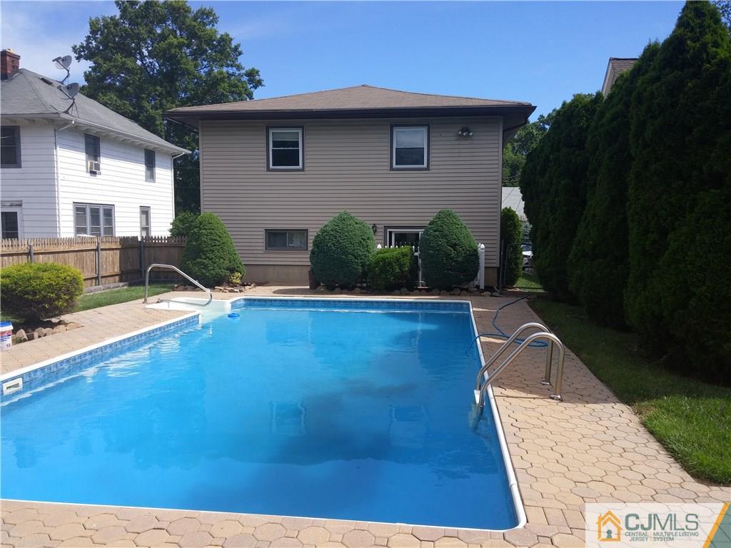 63 Enfield Road Colonia, NJ 07067 - Photo 2 of 17 a view of a house with pool patio
