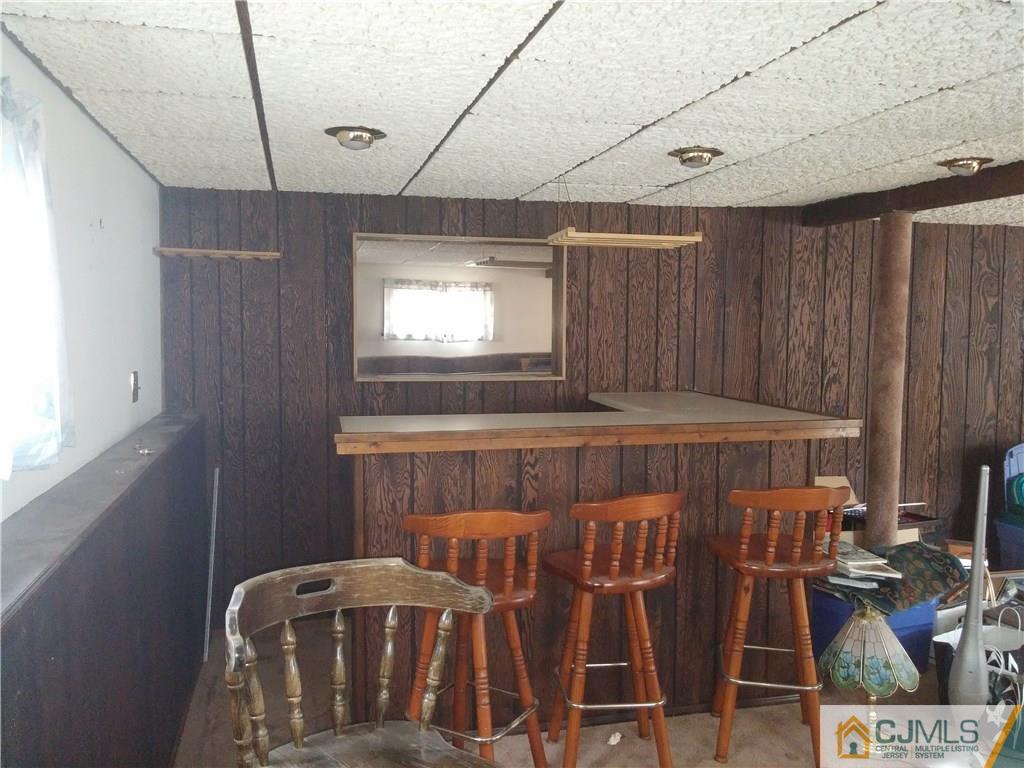 63 Enfield Road Colonia, NJ 07067 - Photo 8 of 17 a view of a chairs and table in a room