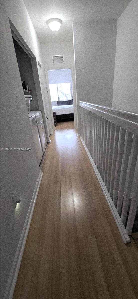 5937 Riverside Avenue Tamarac, FL 33321 - Photo 20 of 31 a view of entryway with wooden floor