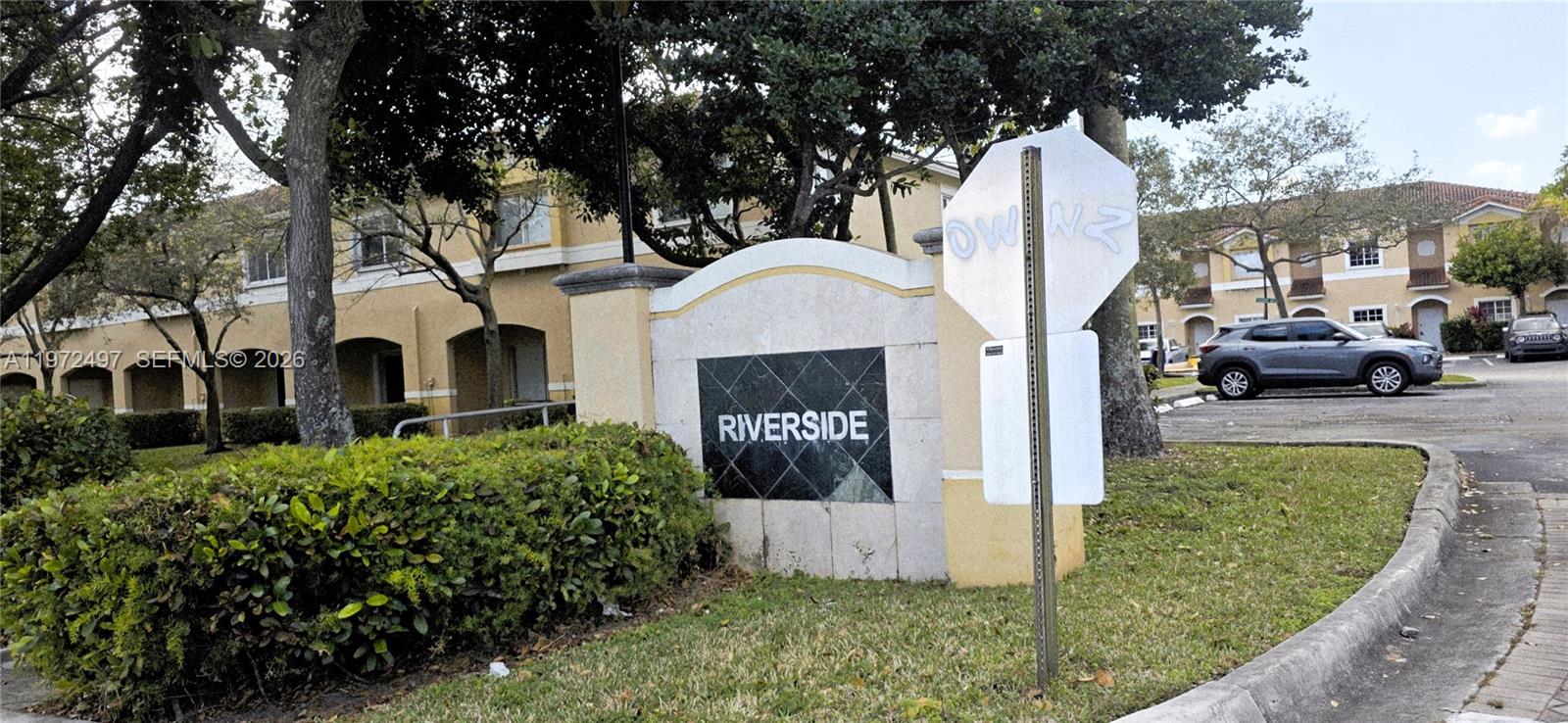 5937 Riverside Avenue Tamarac, FL 33321 - Photo 30 of 31 a front view of a house with garden
