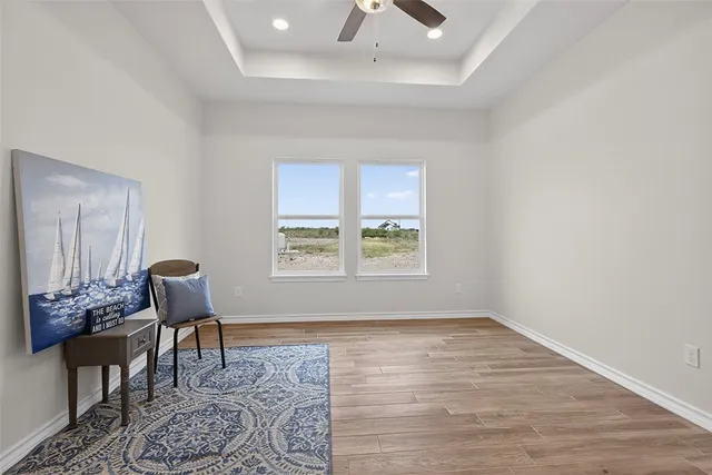 a workspace with furniture and a window