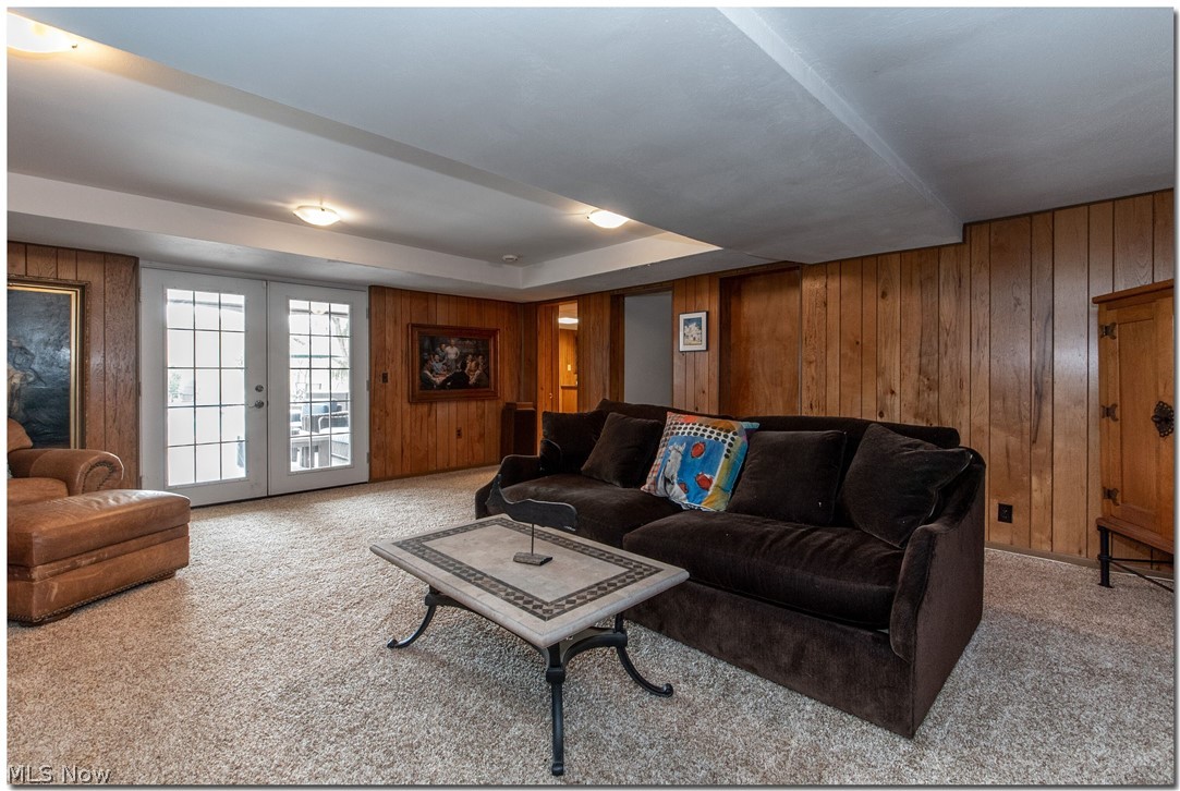 33955 Old Kinsman Road Hunting Valley, OH 44022 - Photo 29 of 35 The walk out lower level rec room has access to a covered patio and the pool.