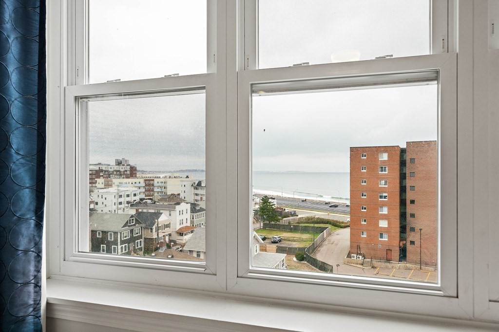 20 Rockland House Road, Unit 406 Hull, MA 02045 - Photo 24 of 39 a view of a glass door and a window