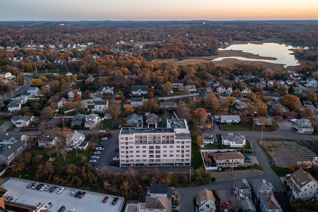 20 Rockland House Road, Unit 406 Hull, MA 02045 - Photo 35 of 39 an aerial view of residential house and sandy dunes