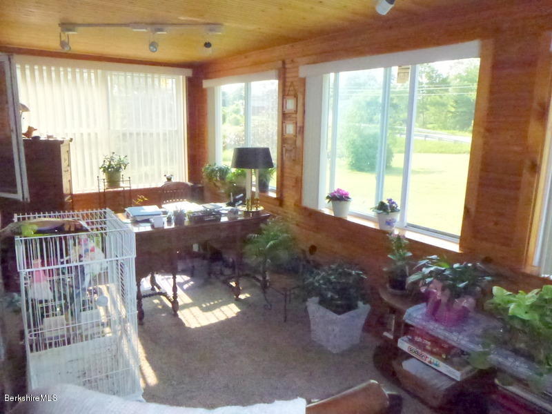 148 Mohawk Trail Florida, MA 01247 - Photo 13 of 18 a living room filled with furniture window and a table