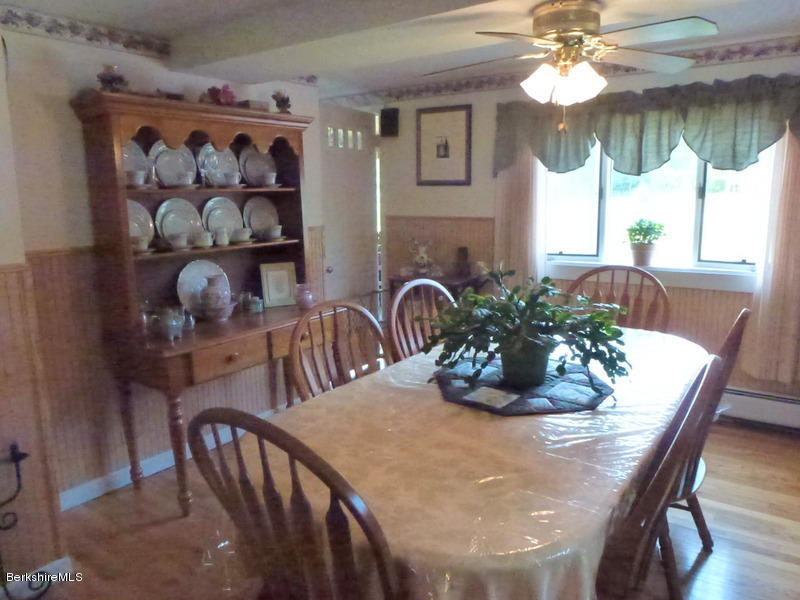 148 Mohawk Trail Florida, MA 01247 - Photo 7 of 18 a view of a dining room with furniture window and outside view