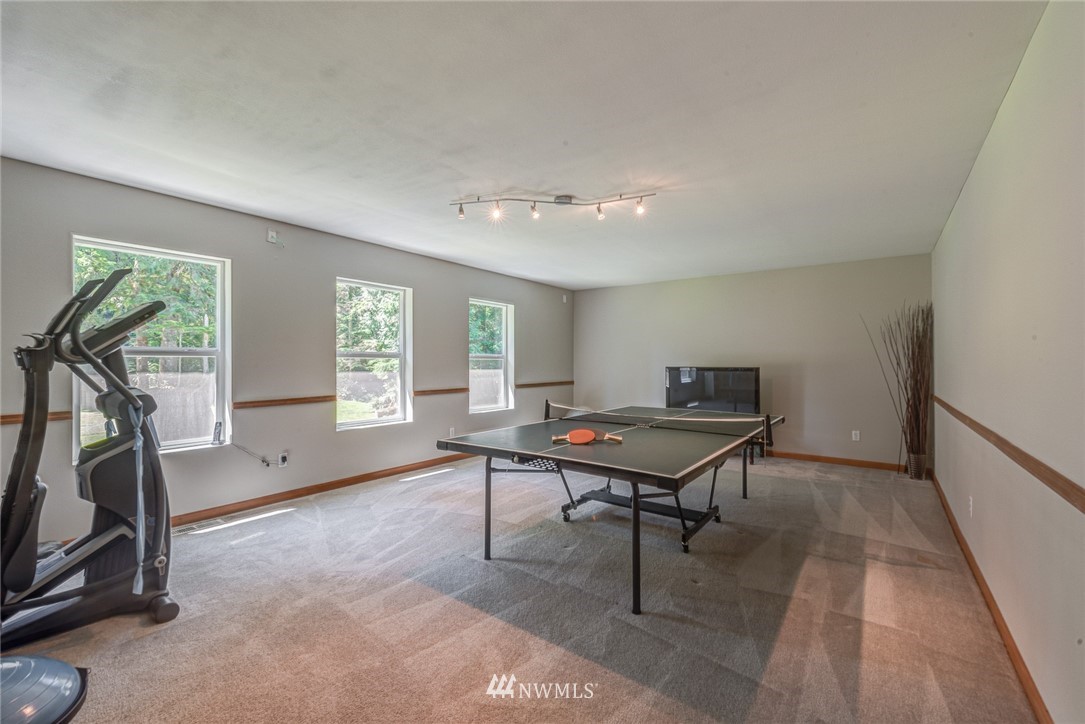 16108 OK Mill Road Snohomish, WA 98290 - Photo 17 of 23 a room with furniture pool table and windows
