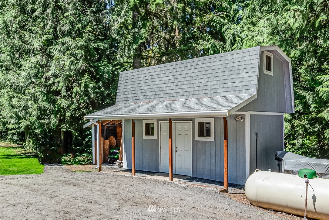 16108 OK Mill Road Snohomish, WA 98290 - Photo 18 of 23 a front view of a house with garden